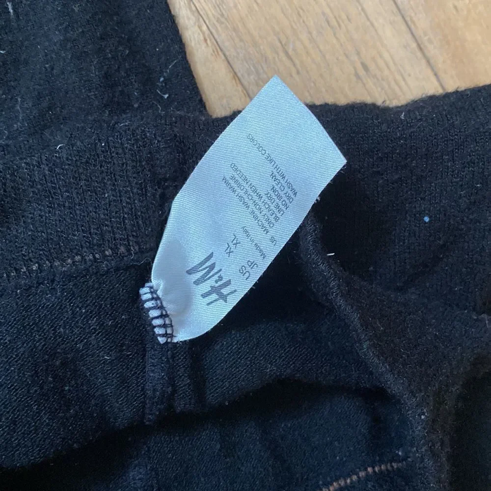 Bundle of two pairs of tights, H&M black and unlabeled gray.